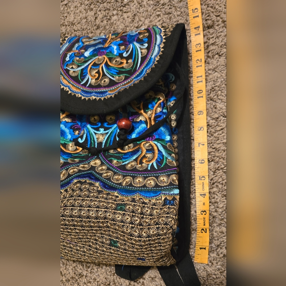 Embroidered black & blue backpack